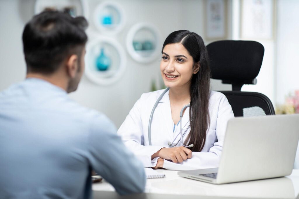 Doctor consulting with patient 